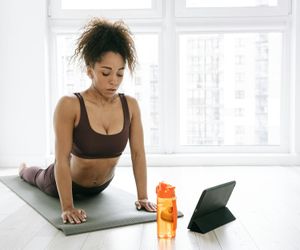 Close up of a yoga mat and water bottle
